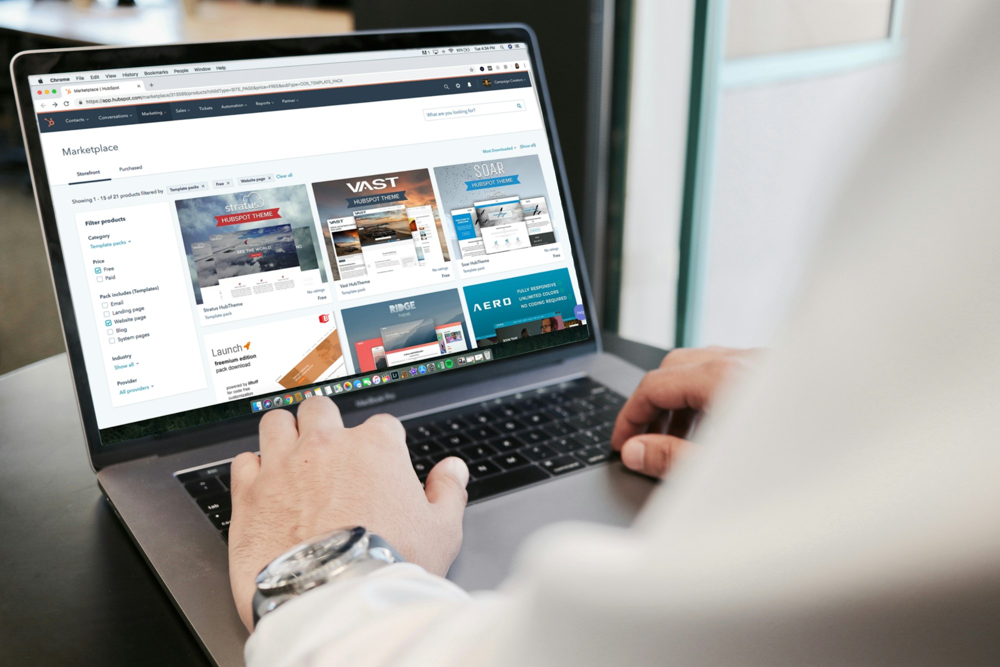Browsing website designs on a laptop